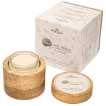 Diamond Shine Face Brightener open in its mango-wood vessel beside its box, showing the pearl-white texture