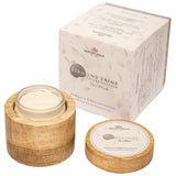 Diamond Shine Face Brightener open in its mango-wood vessel beside its box, showing the pearl-white texture