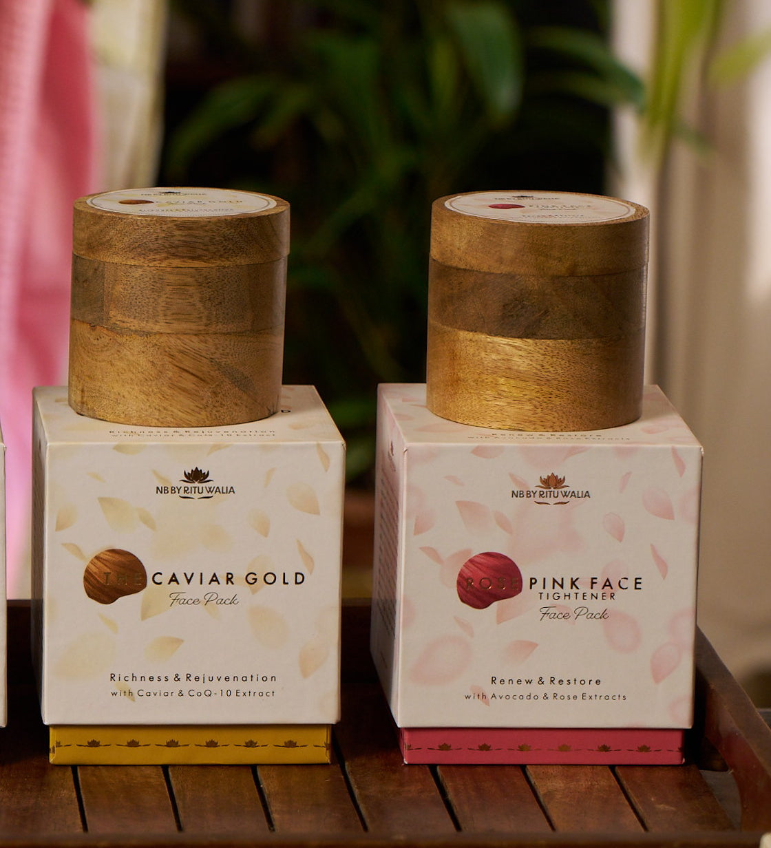 Rose & Caviar Set — Rose Pink Face Tightener and The Caviar Gold Face Pack in their boxes, mango-wood jars above