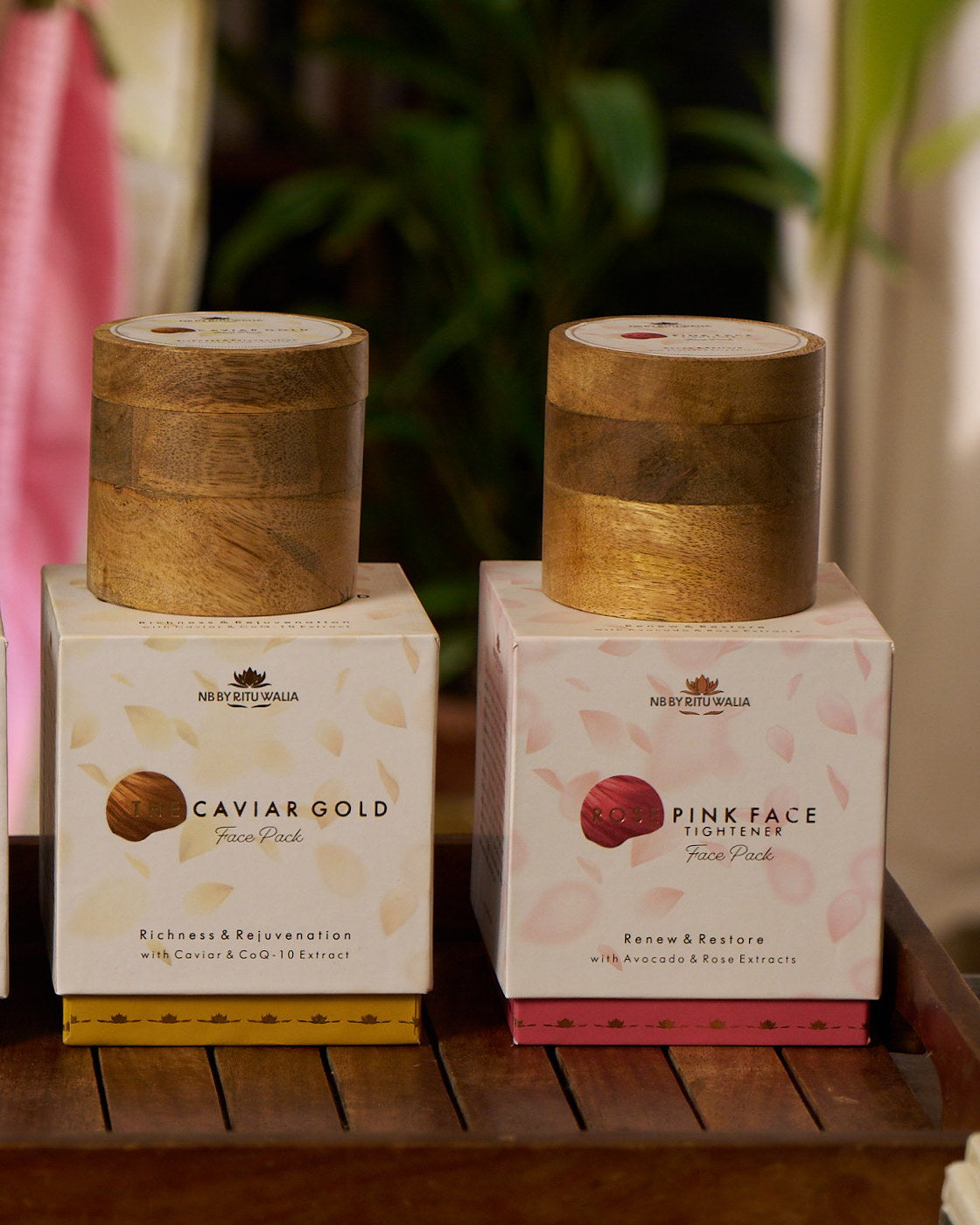 Rose & Caviar Set — Rose Pink Face Tightener and The Caviar Gold Face Pack in their boxes, mango-wood jars above