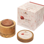 Rose Pink Face Tightener open in its mango-wood vessel beside its box, showing the rose-toned texture